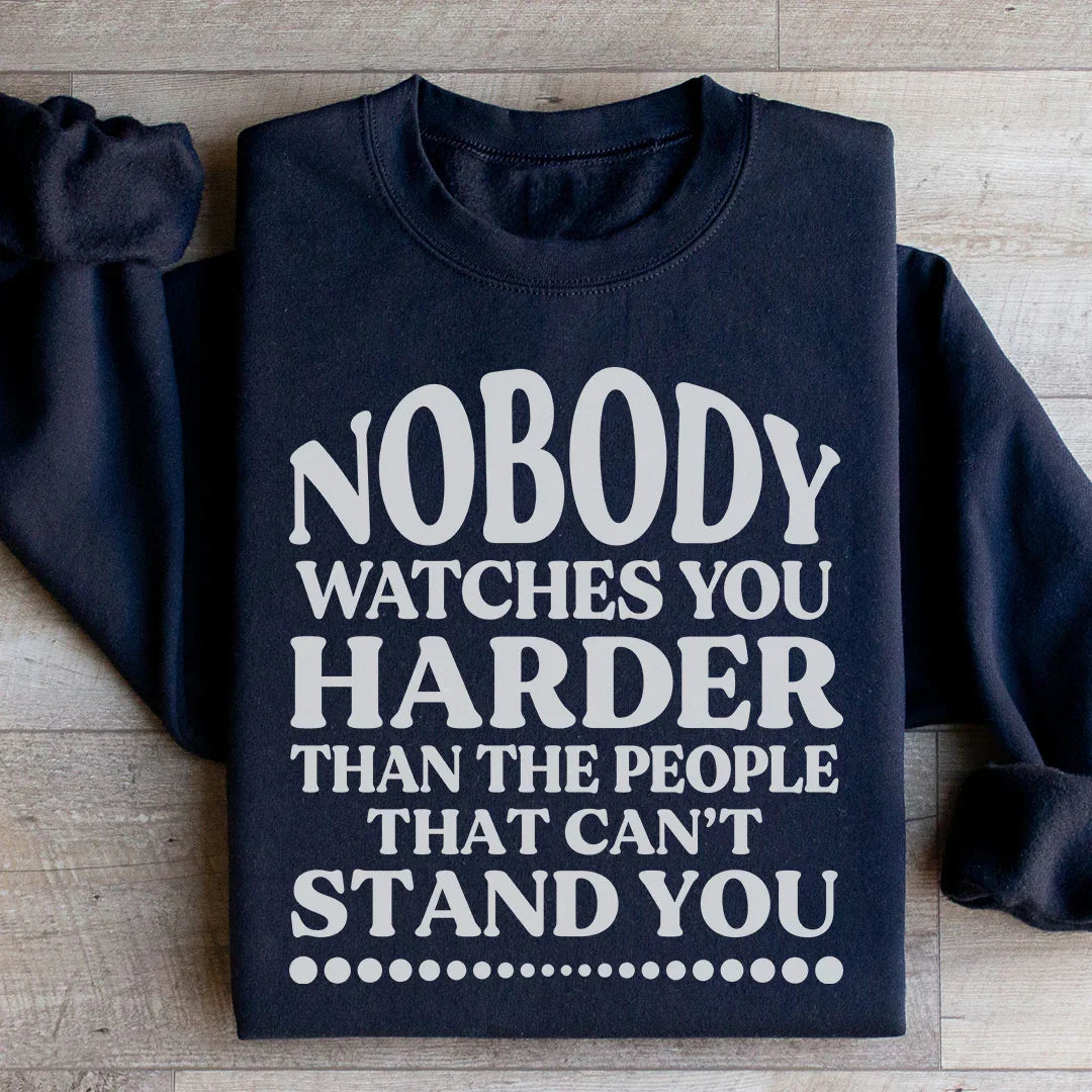 Nobody Watches You Harder Than The People That Can't Stand You Sweatshirt - WonderingCloth