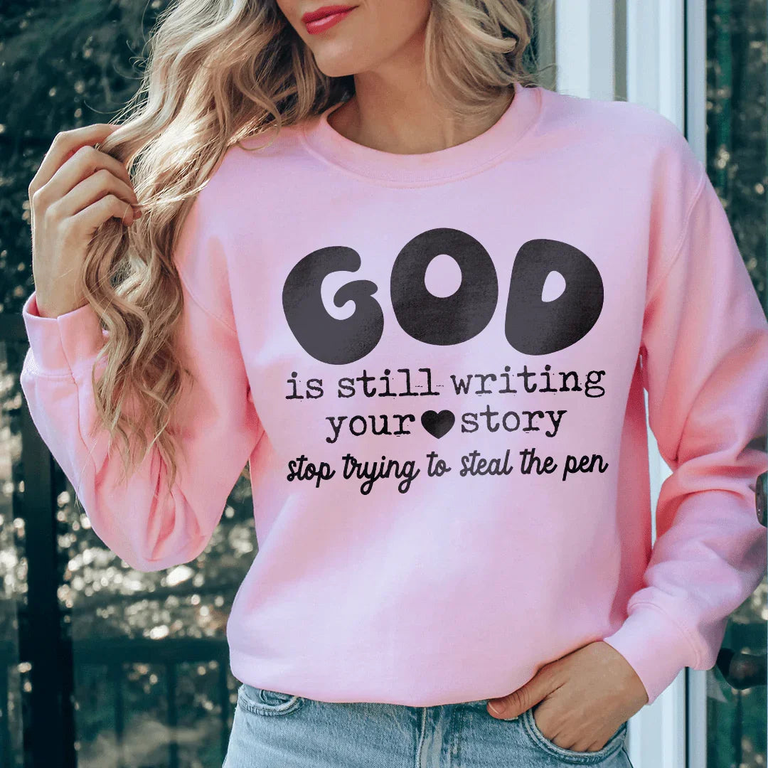 God Is Still Writing Your Story Stop Trying To Steal The Pen  Sweatshirt - WonderingCloth