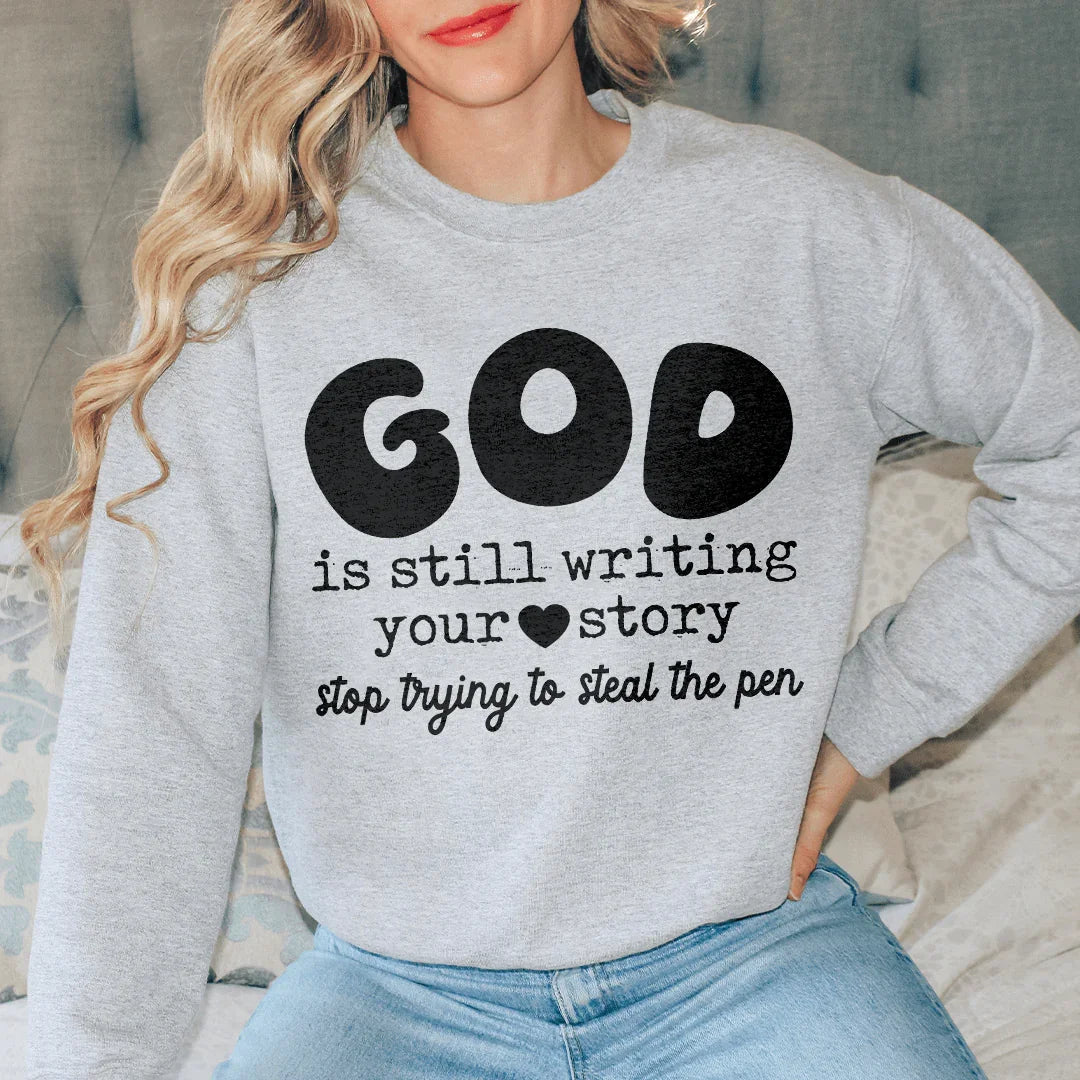 God Is Still Writing Your Story Stop Trying To Steal The Pen  Sweatshirt - WonderingCloth