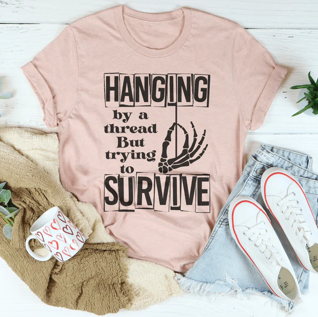 Hanging By A Thread But Trying To Survive Tee - WonderingCloth