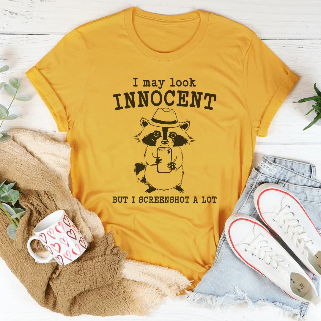 I May Look Innocent But I Screenshot A Lot Tee - WonderingCloth