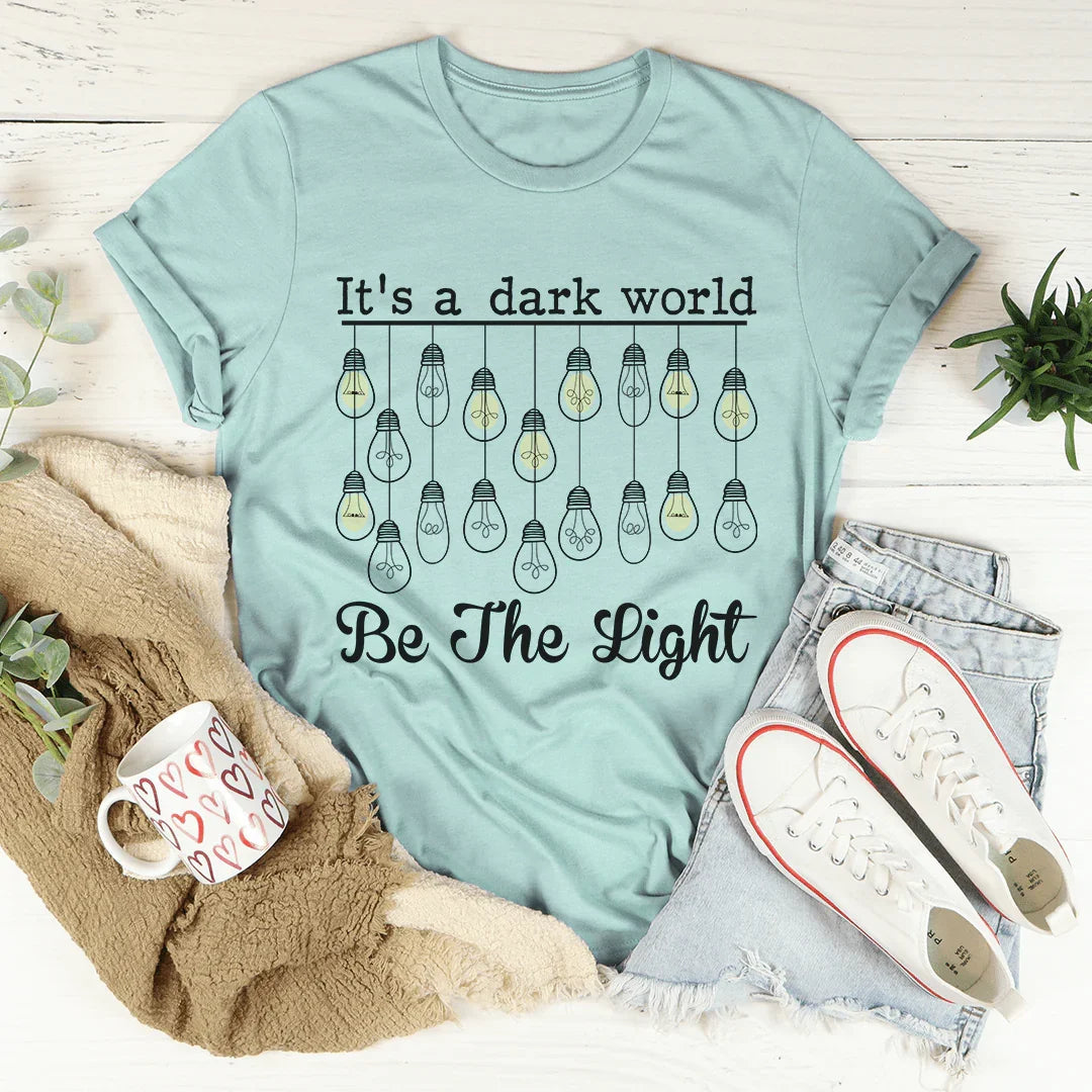 It's A Dark World Be The Light Tee - WonderingCloth