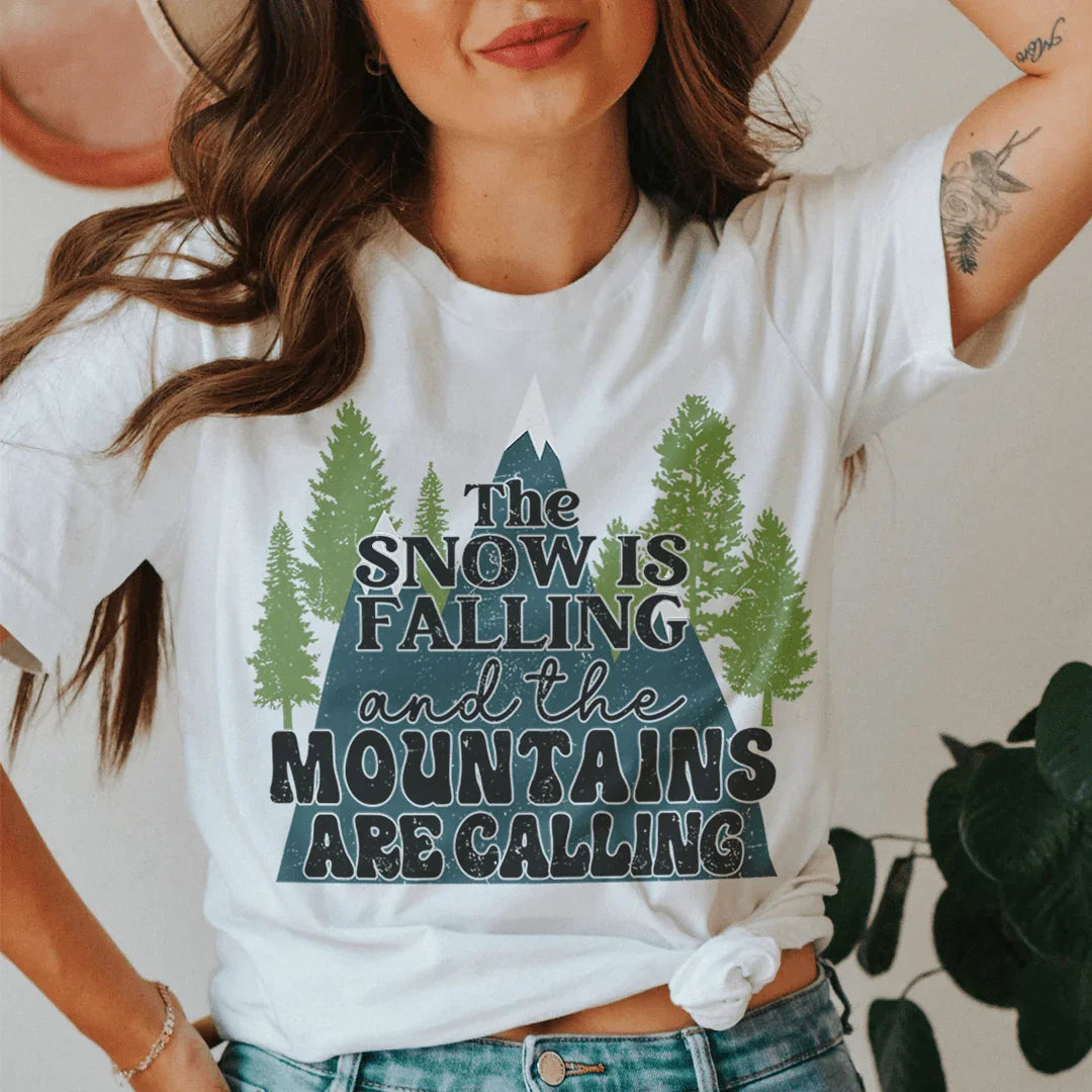 The Snow Is Falling And The Mountains Are Calling Tee - WonderingCloth